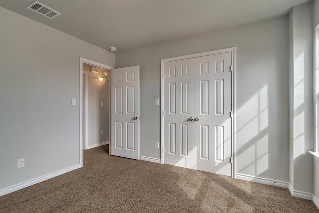 interior space with dark carpet