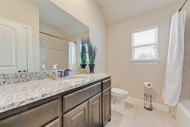 full bathroom featuring lofted ceiling, vanity, shower / bath combination with curtain, tile patterned floors, and toilet