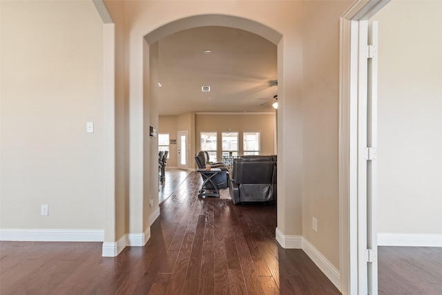 hallway featuring dark wood-type flooring