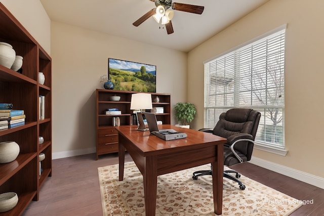 home office featuring ceiling fan and hardwood / wood-style floors