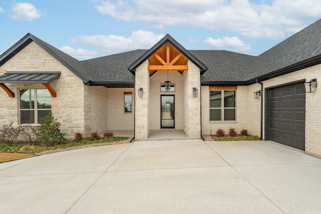 view of front of home featuring a garage