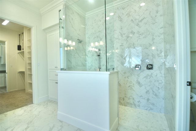 bathroom featuring crown molding and tiled shower