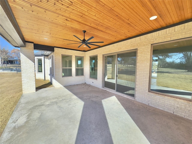 view of patio featuring ceiling fan