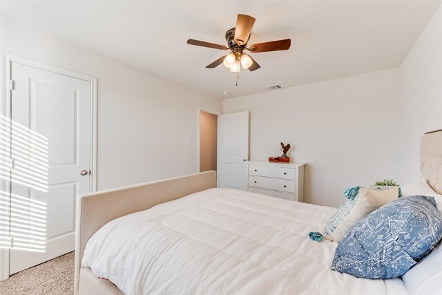 carpeted bedroom featuring ceiling fan