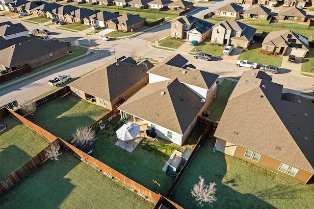 birds eye view of property with a residential view