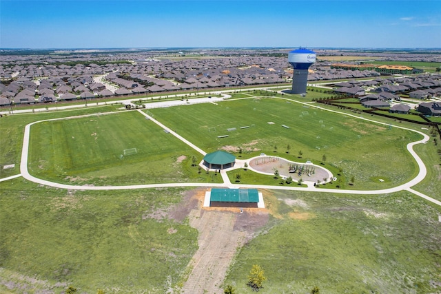 birds eye view of property with a residential view