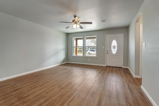 entrance foyer featuring ceiling fan and hardwood / wood-style floors