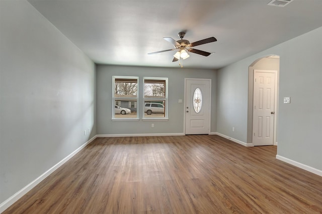 entrance foyer featuring ceiling fan and wood-type flooring