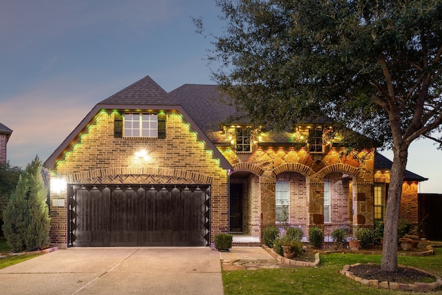 view of front of property featuring a garage