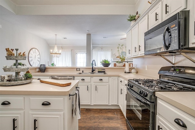 kitchen with white cabinetry, dark hardwood / wood-style flooring, hanging light fixtures, black appliances, and sink