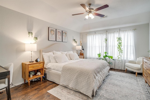 bedroom featuring dark wood-type flooring and ceiling fan