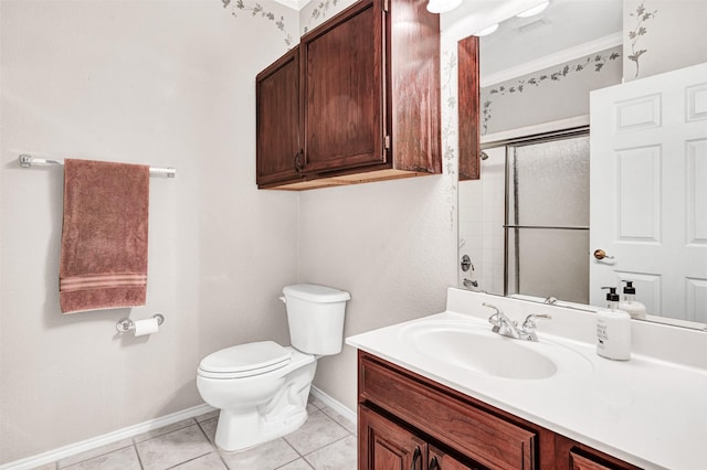 bathroom featuring walk in shower, toilet, ornamental molding, vanity, and tile patterned flooring