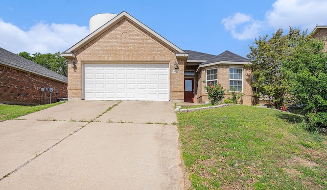 ranch-style home featuring brick siding, driveway, an attached garage, and a front lawn