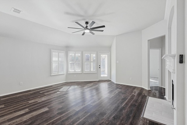 unfurnished living room with lofted ceiling, dark hardwood / wood-style floors, and ceiling fan