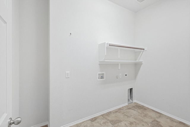 clothes washing area featuring washer hookup, hookup for an electric dryer, and hookup for a gas dryer