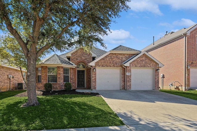 single story home with a garage and a front yard