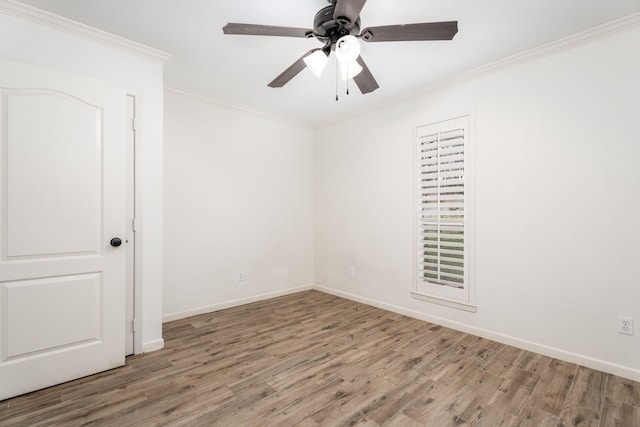 unfurnished room featuring ceiling fan, crown molding, and hardwood / wood-style floors