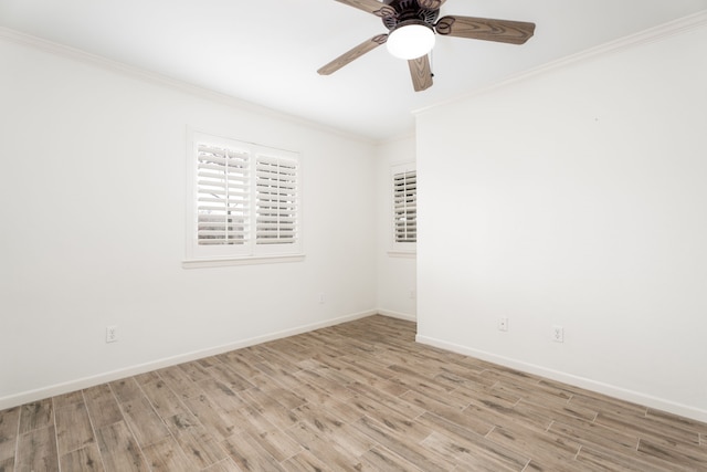 spare room with ceiling fan, ornamental molding, and light wood-type flooring