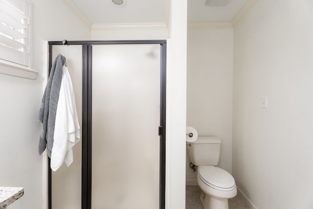 bathroom featuring tile patterned floors, walk in shower, ornamental molding, and toilet