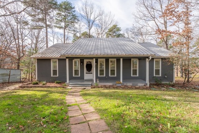 view of front of property with a front yard and a porch