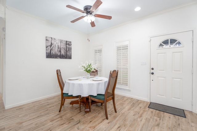 dining room featuring ceiling fan, light hardwood / wood-style flooring, and ornamental molding