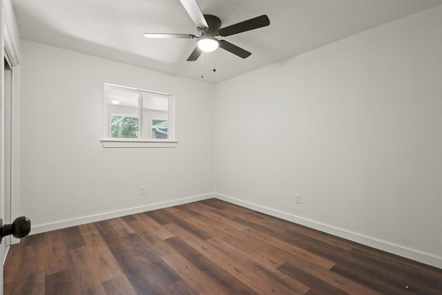 unfurnished room with dark wood-type flooring and ceiling fan