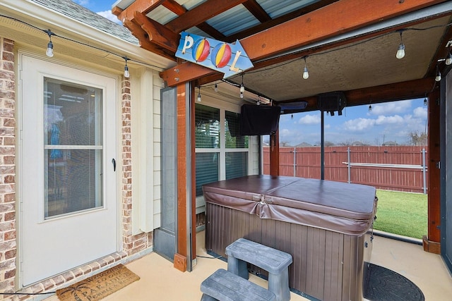 view of patio with a hot tub