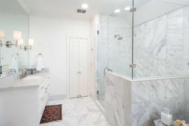 bathroom with visible vents, crown molding, a stall shower, marble finish floor, and vanity