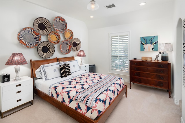 bedroom with recessed lighting, visible vents, baseboards, and light colored carpet