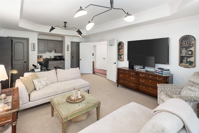 living room featuring a raised ceiling, light carpet, and crown molding