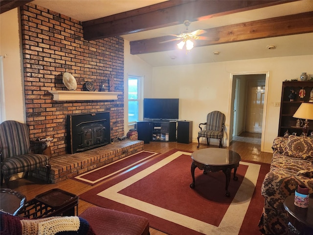 living room featuring beamed ceiling, ceiling fan, and hardwood / wood-style floors