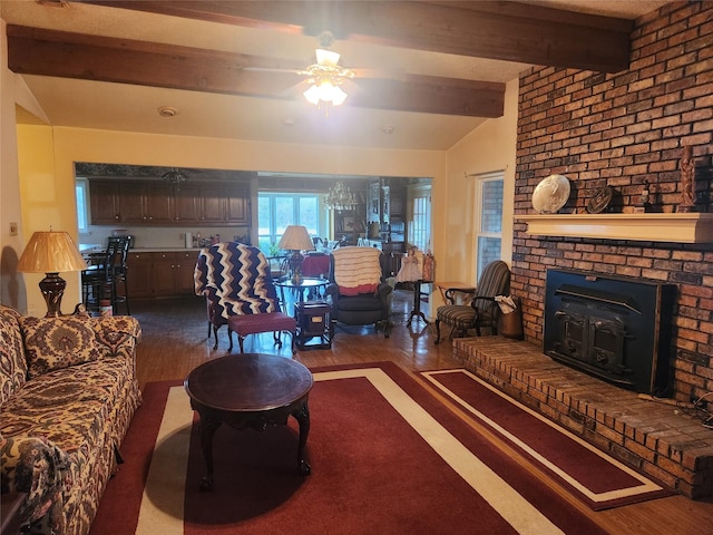 living room featuring vaulted ceiling with beams, wood-type flooring, and ceiling fan