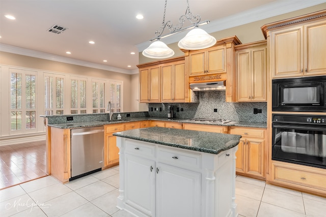 kitchen featuring sink, light tile patterned floors, black appliances, and a kitchen island