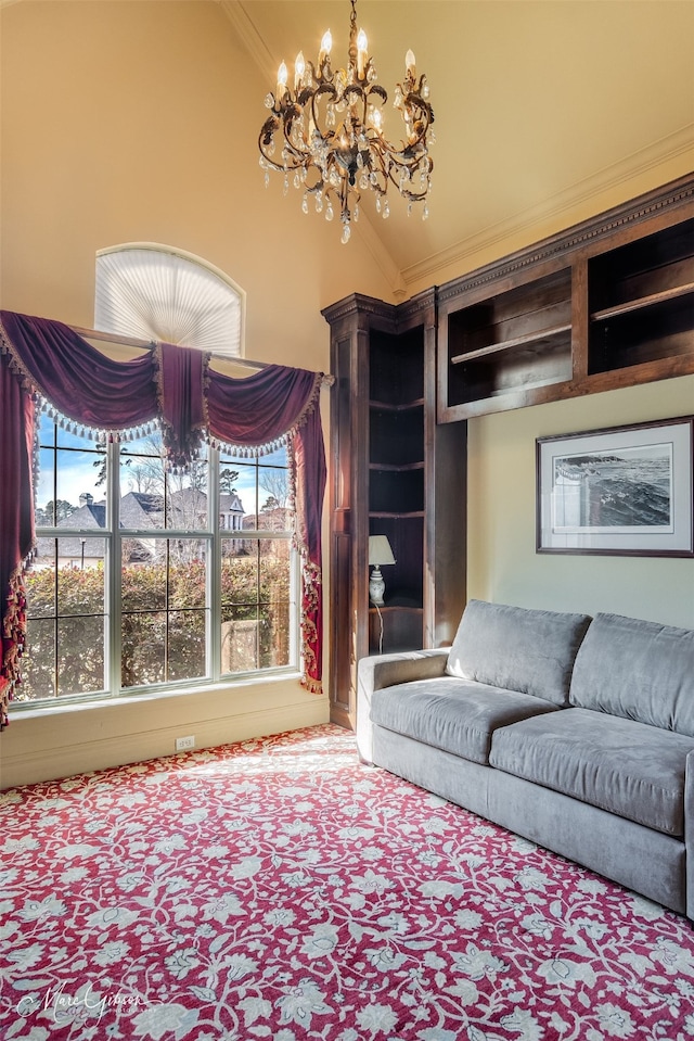 living room featuring lofted ceiling, a chandelier, and ornamental molding