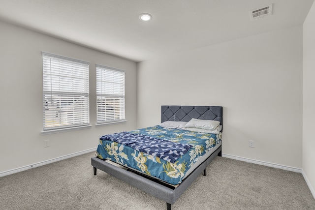 bedroom featuring carpet