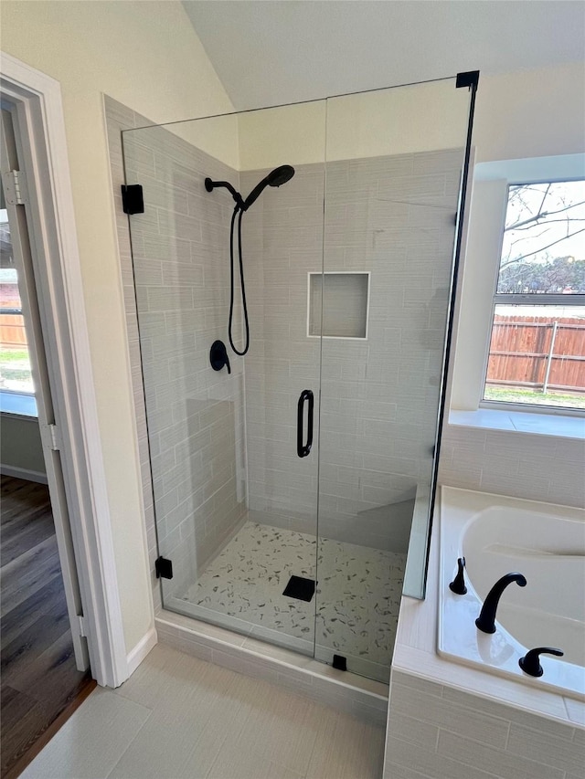 bathroom with plus walk in shower and tile patterned floors