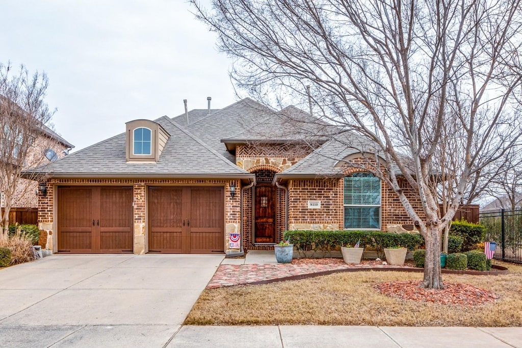 view of front of property featuring a garage