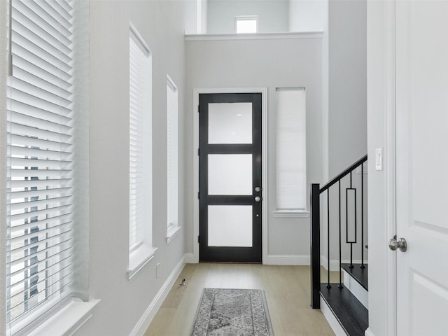 foyer with light hardwood / wood-style flooring