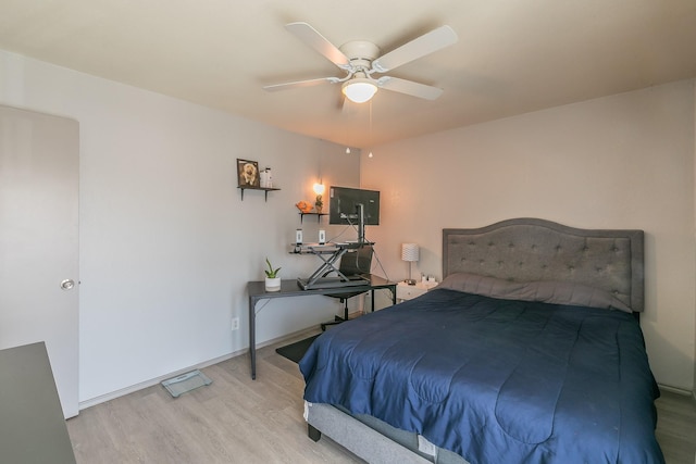 bedroom featuring ceiling fan and light wood-type flooring