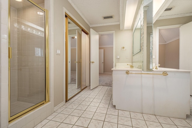 bathroom featuring visible vents, crown molding, a shower stall, and a textured ceiling