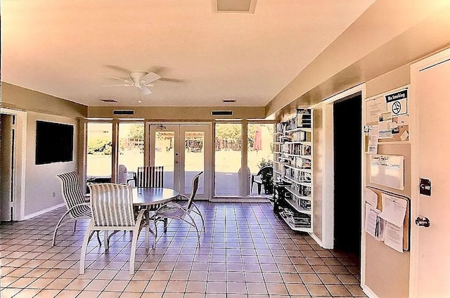 dining room with french doors, ceiling fan, and light tile patterned floors