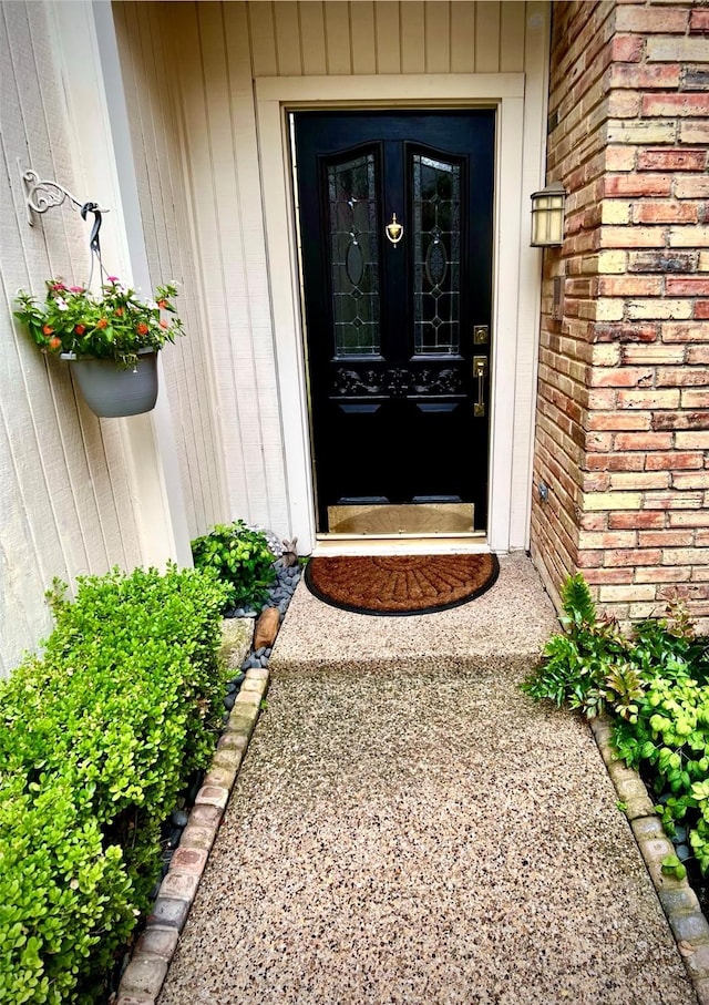 property entrance featuring french doors