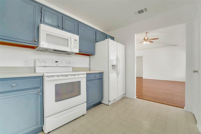 kitchen with white appliances, ceiling fan, and blue cabinets