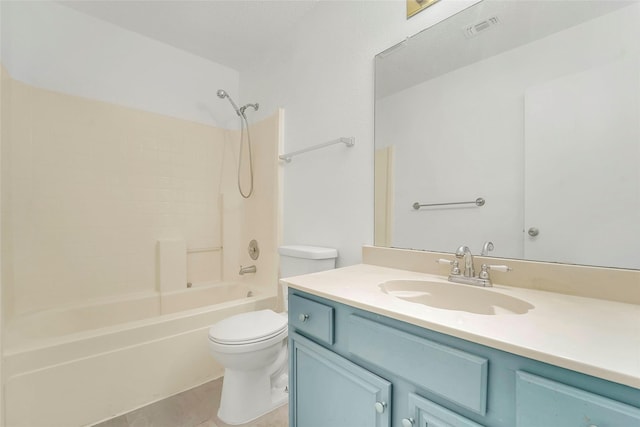 full bathroom featuring tile patterned flooring, vanity, bathing tub / shower combination, and toilet