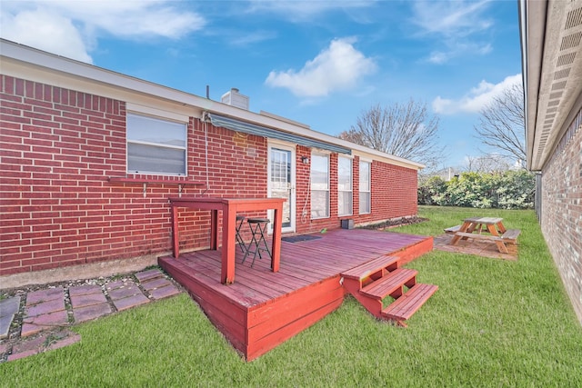 deck featuring a yard