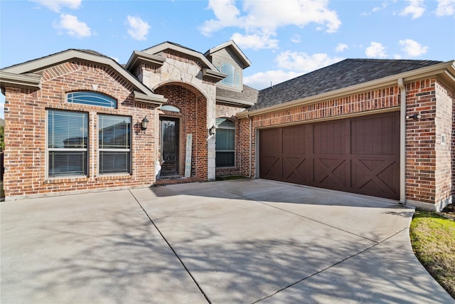 view of front of home with a garage