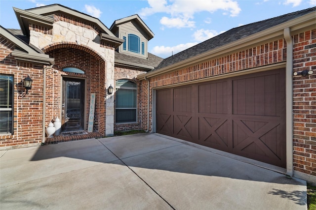 view of front of home featuring a garage