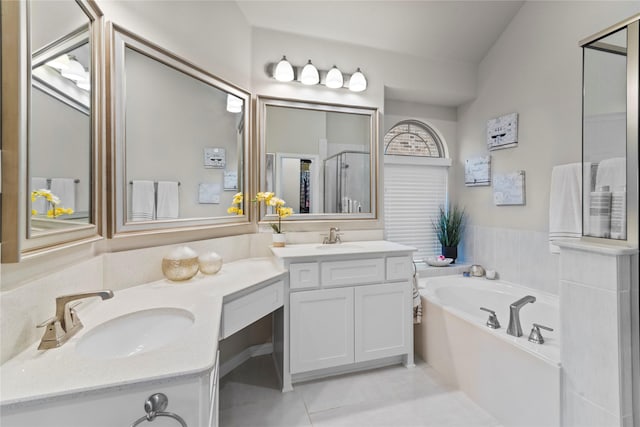 bathroom with independent shower and bath, tile patterned floors, and vanity