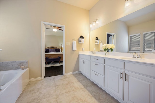 bathroom featuring tile patterned flooring and vanity