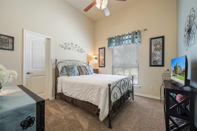 bedroom featuring ceiling fan and carpet flooring